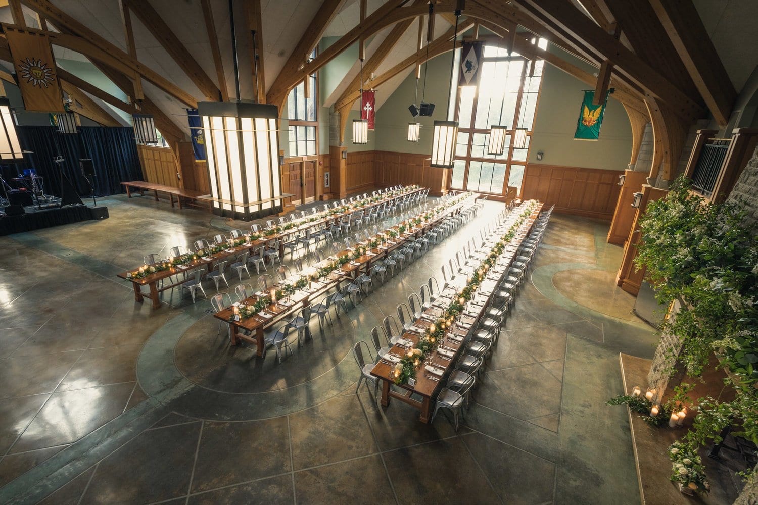 Aerial view of Marion Hall set for a banquet, showing the decorative scored polished-concrete floor.