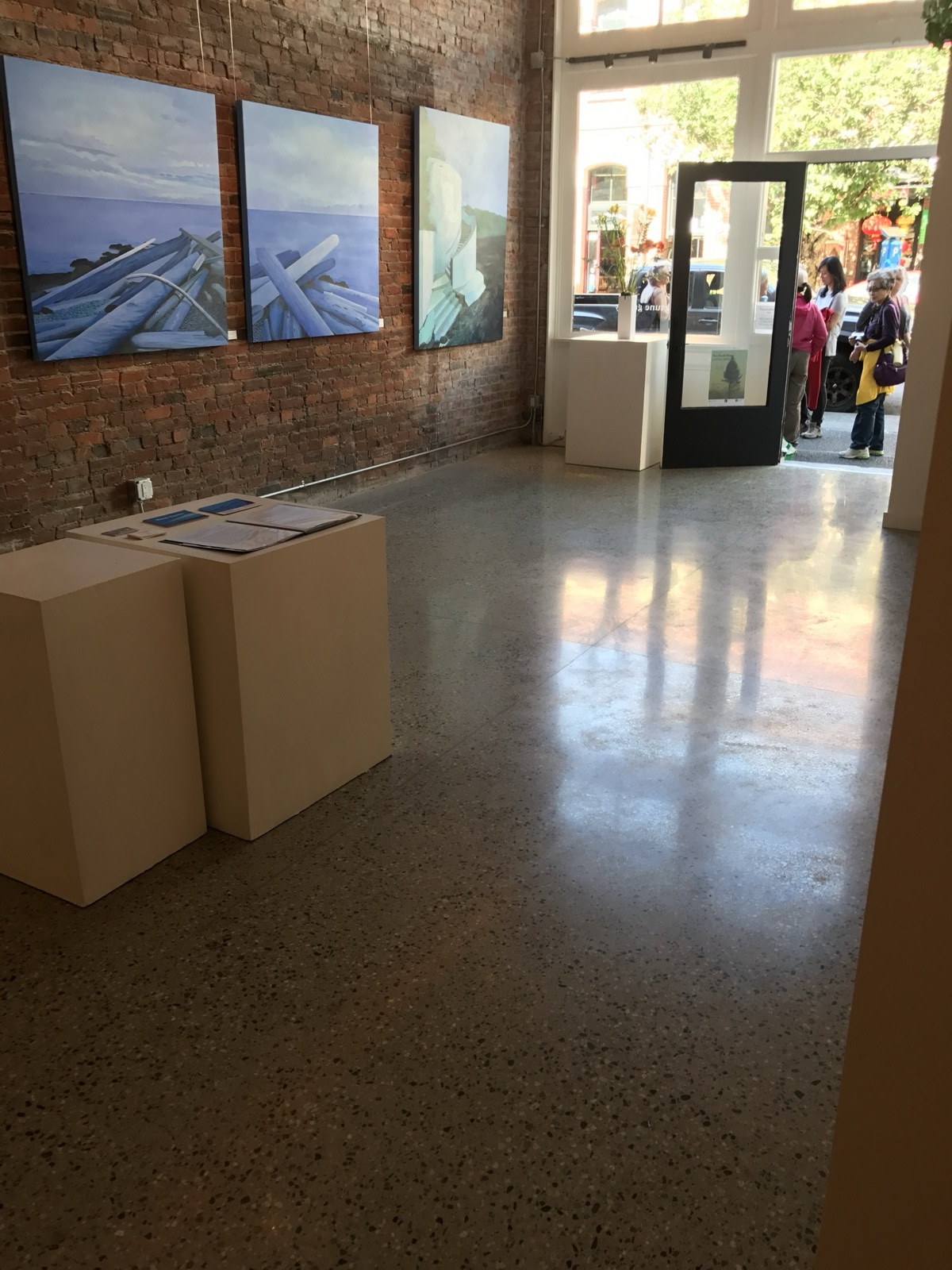 Selected commercial gallery interior with polished concrete floor.