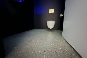 unique bathroom with polished concrete floor