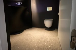 powder room with star lights on ceiling, crazy sink and polished concrete floor