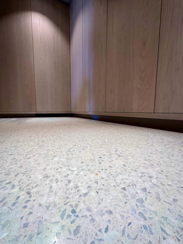 white terrazzo with built in cabinets