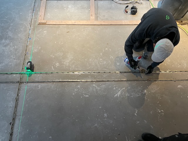 The brass needed to start out level. Pre levelling the floor and shimming was essential.
